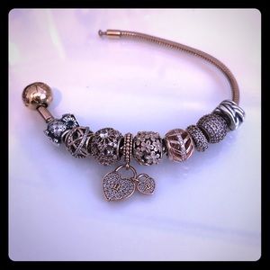 Rose gold pandora bracelet (charms included)